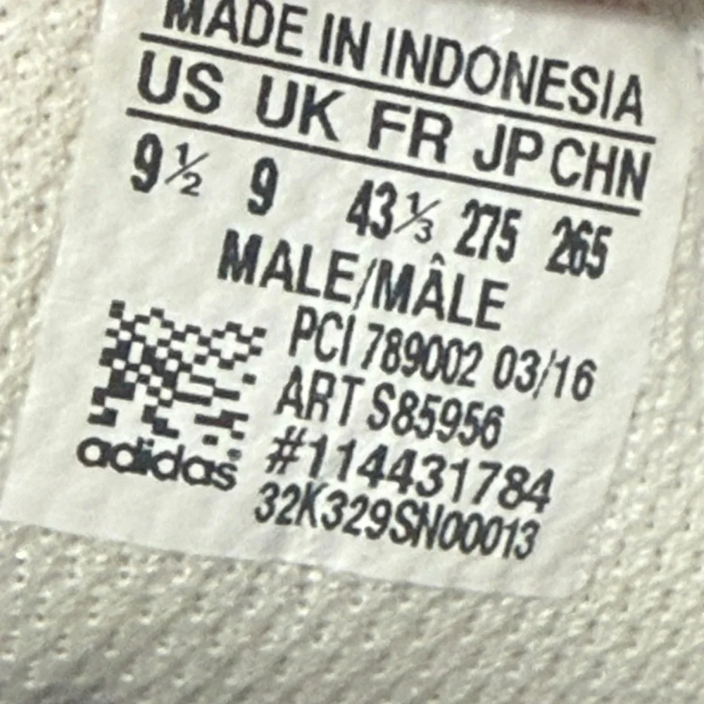 Adidas White and Black High-Top Sneakers